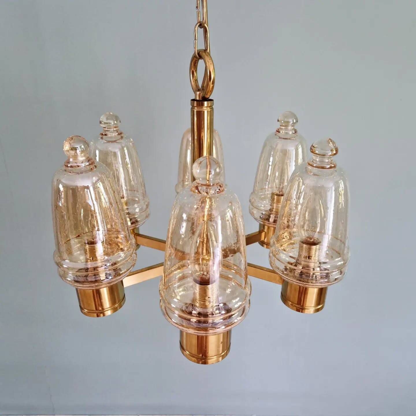 Brass chandelier with amber bubbled glass globes, 1970.