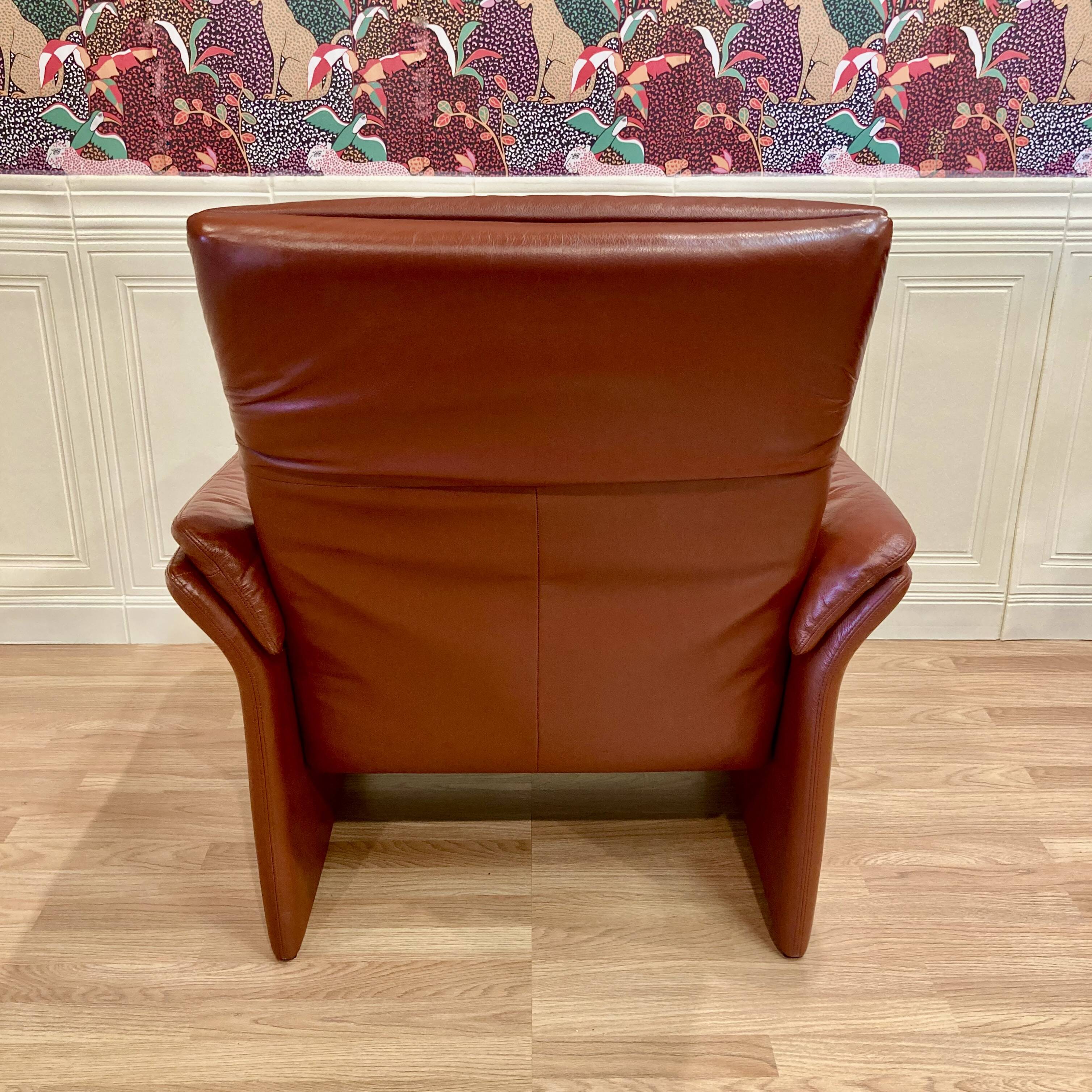 Pair of "Erpo" designer adjustable leather armchairs.