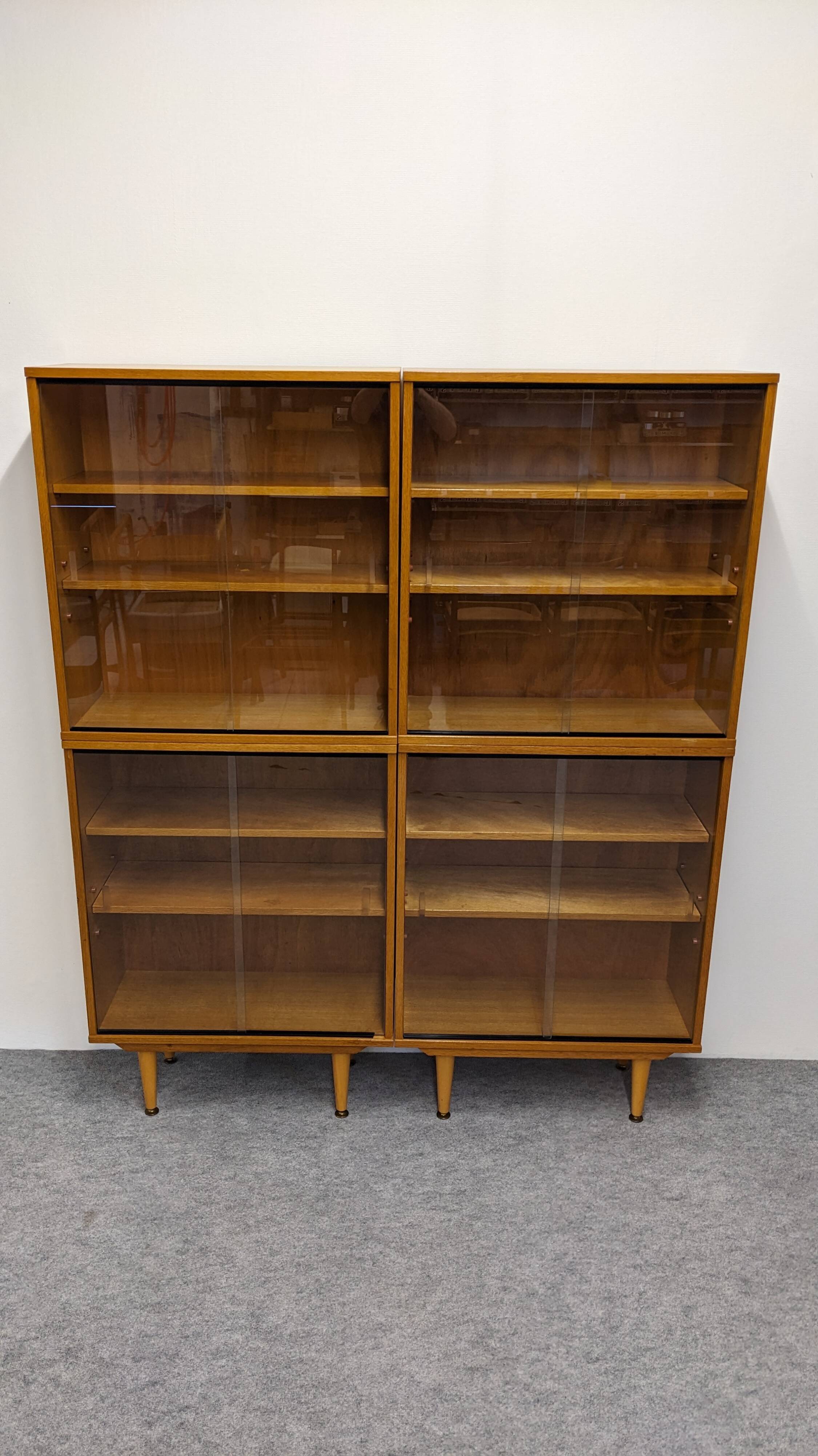 Library or display cabinet with 4 modules in light oak, France around 1960.