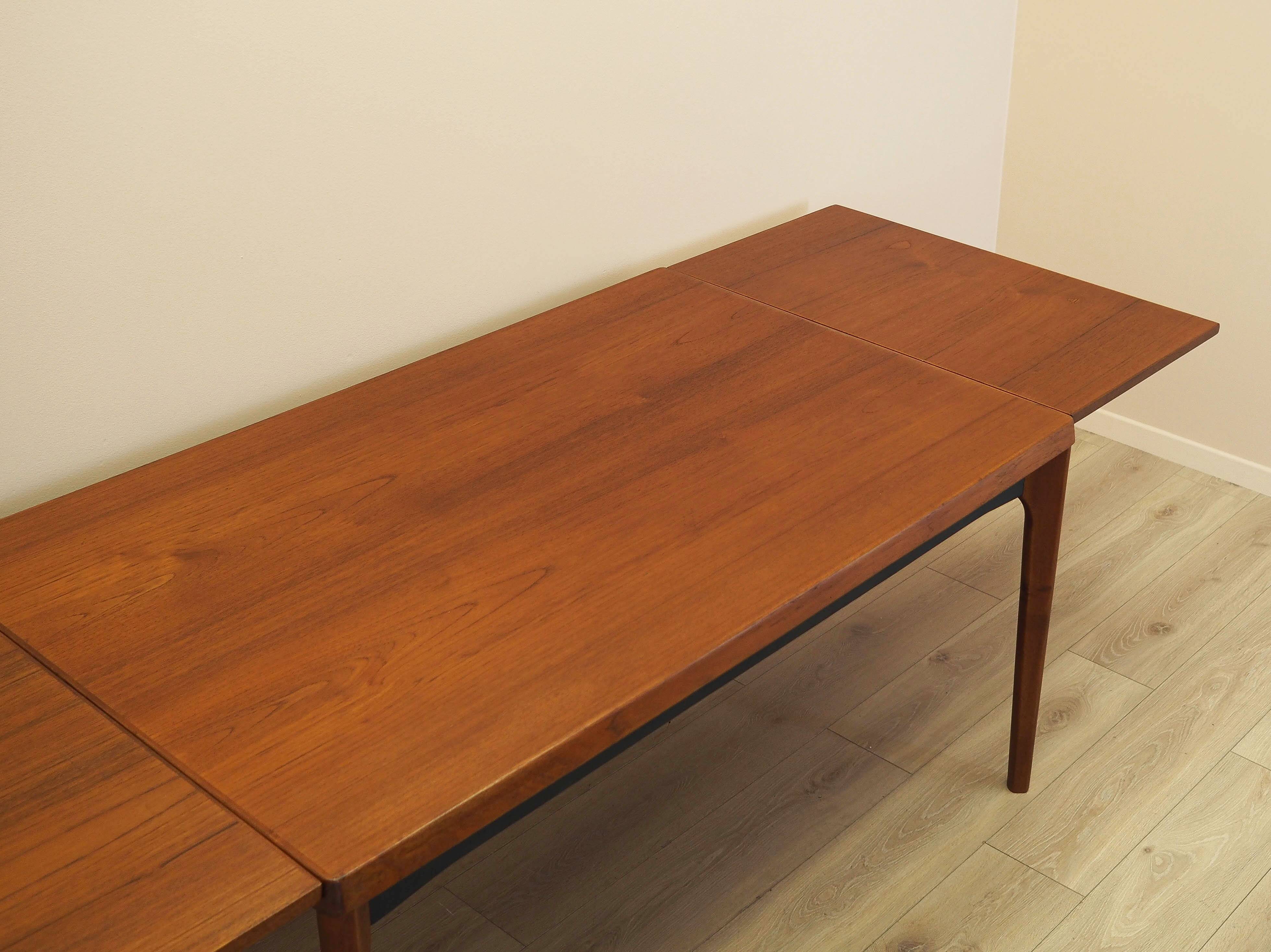 Teak extending dining table Henning Kjærnulf, Vejle, 1960s