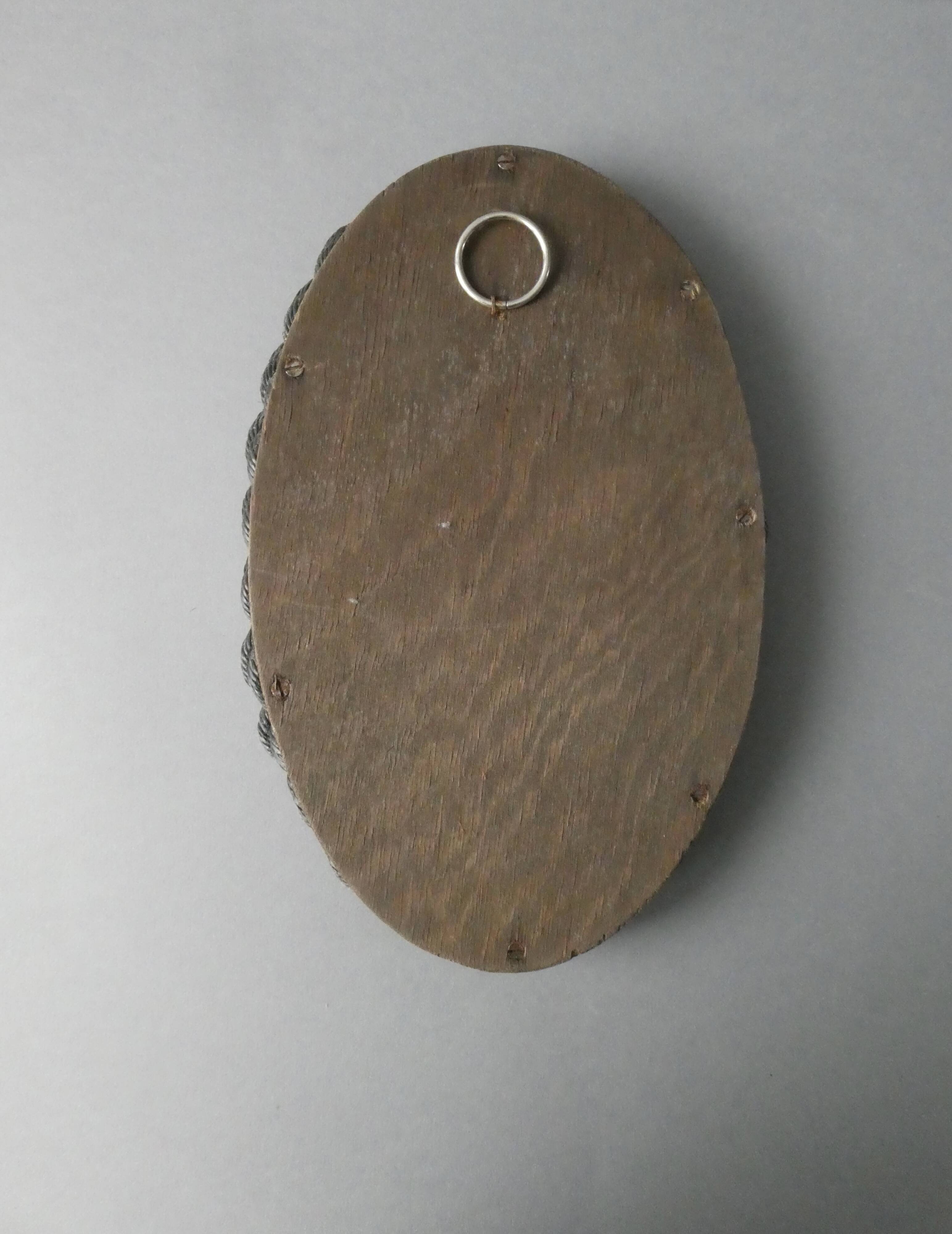 Oval mirror in black rope and gold edging, 1960s