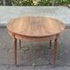 Round extendable dining table Louis XVI stripped in walnut 1960 190cm