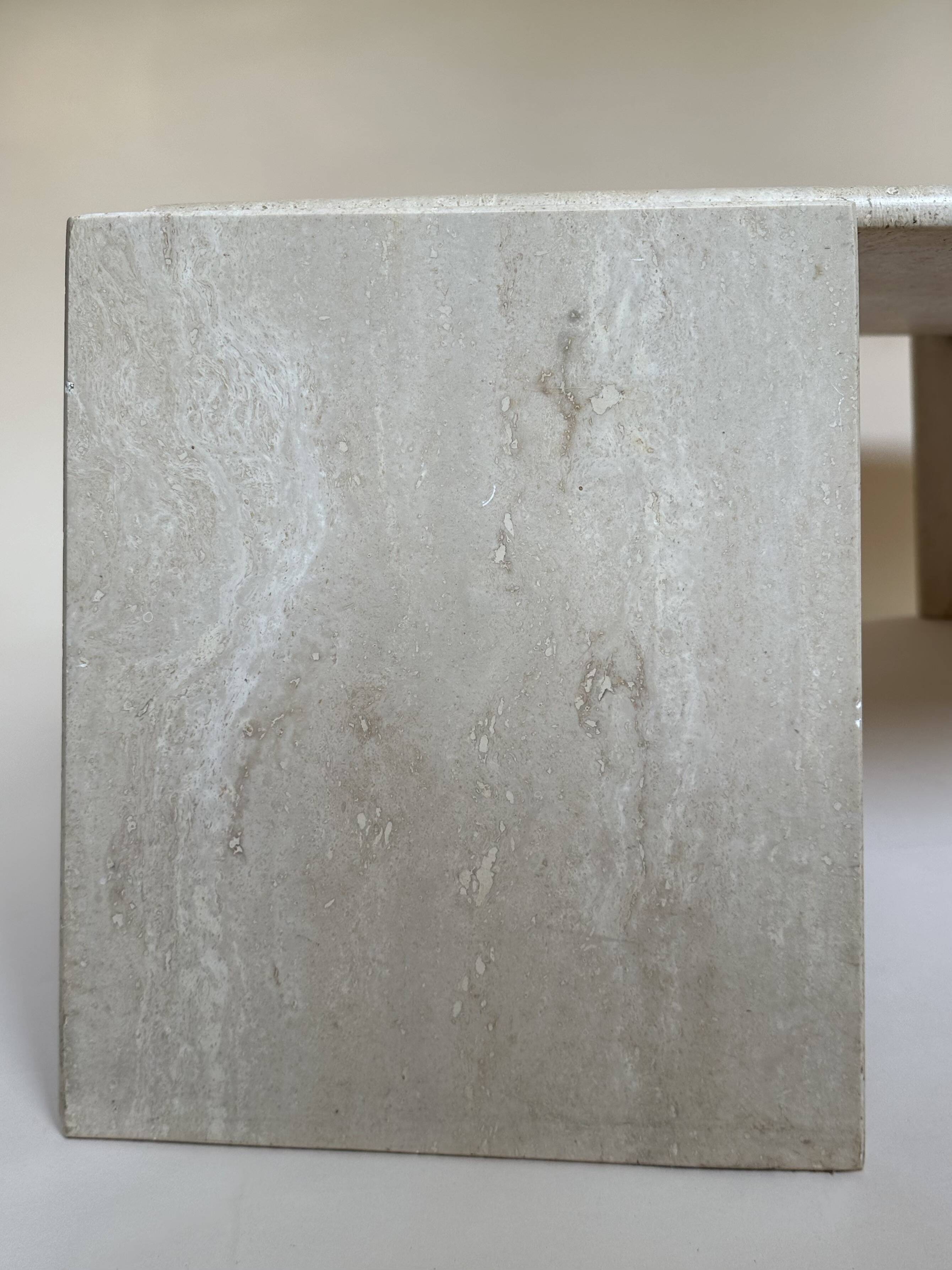 Travertine eye-shaped coffee table