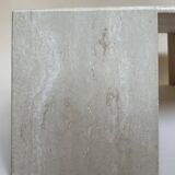 Travertine eye-shaped coffee table