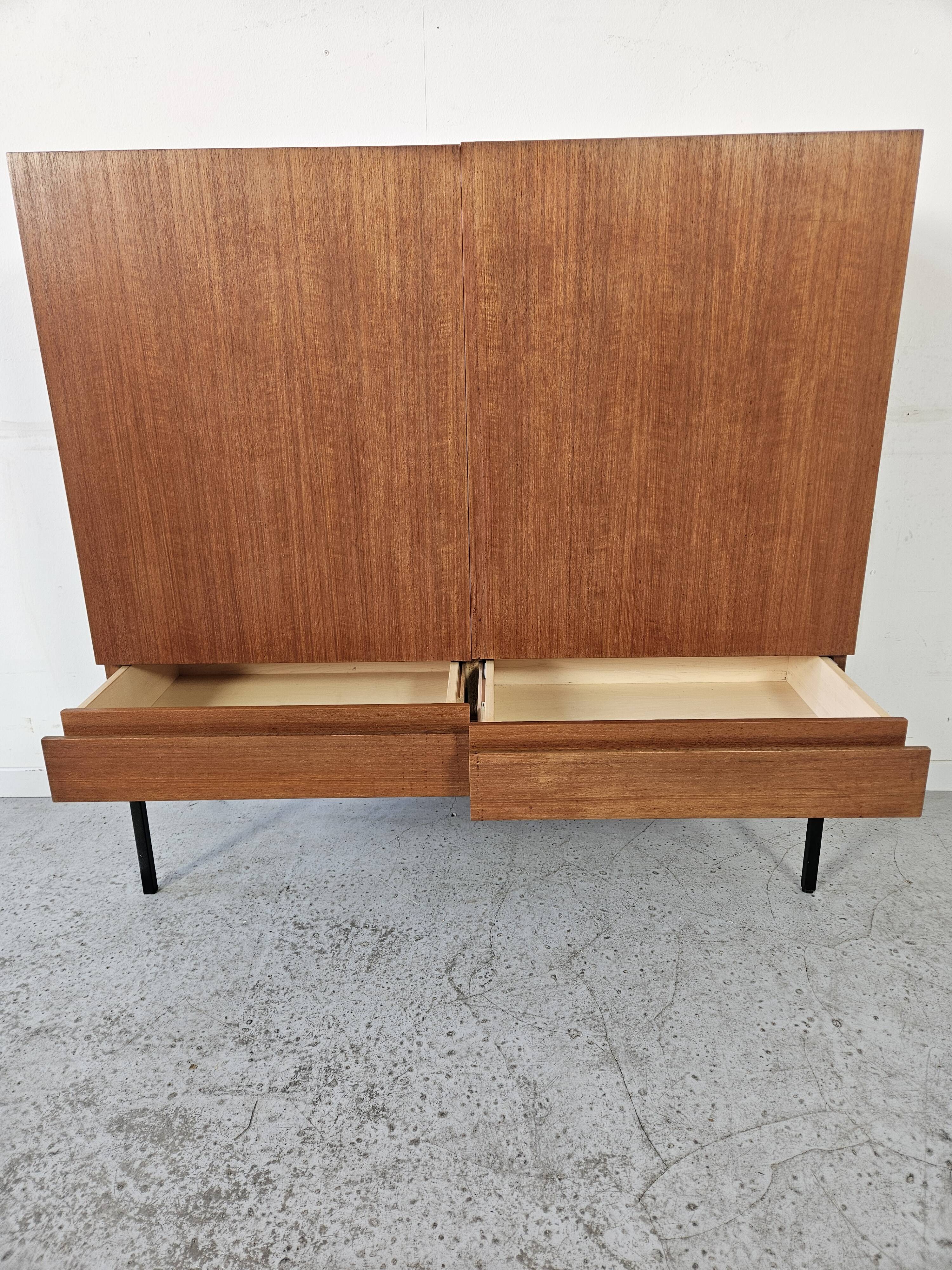 S21 highboard by Dieter Waeckerlin in teak, 1960s.