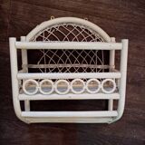 White rattan wall shelf