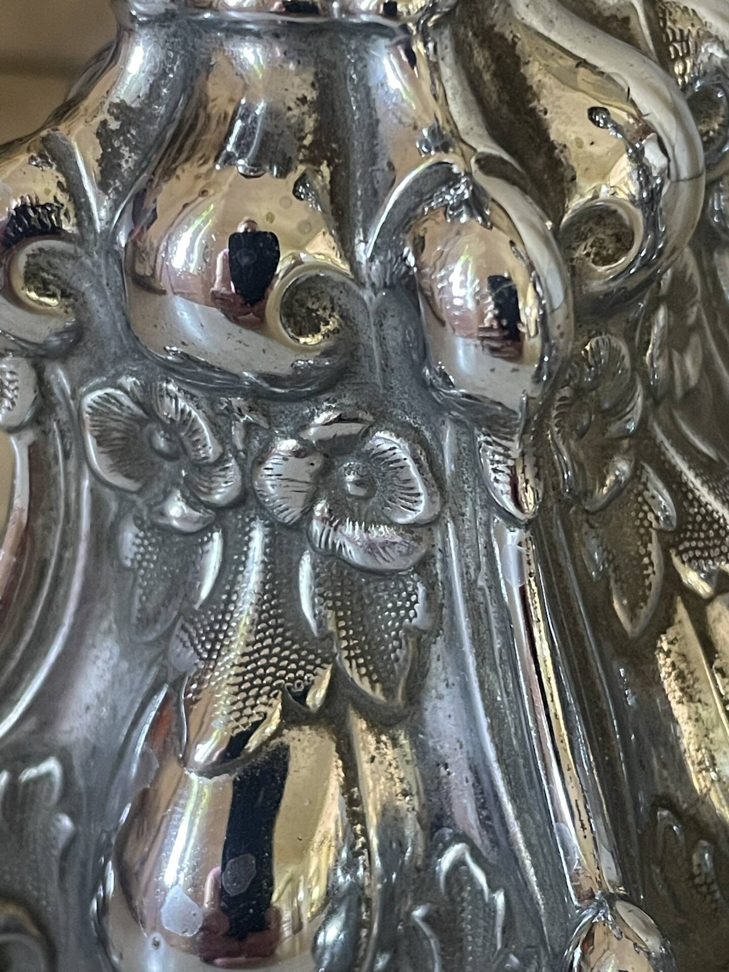 Pair of rococo silver-plated candlesticks