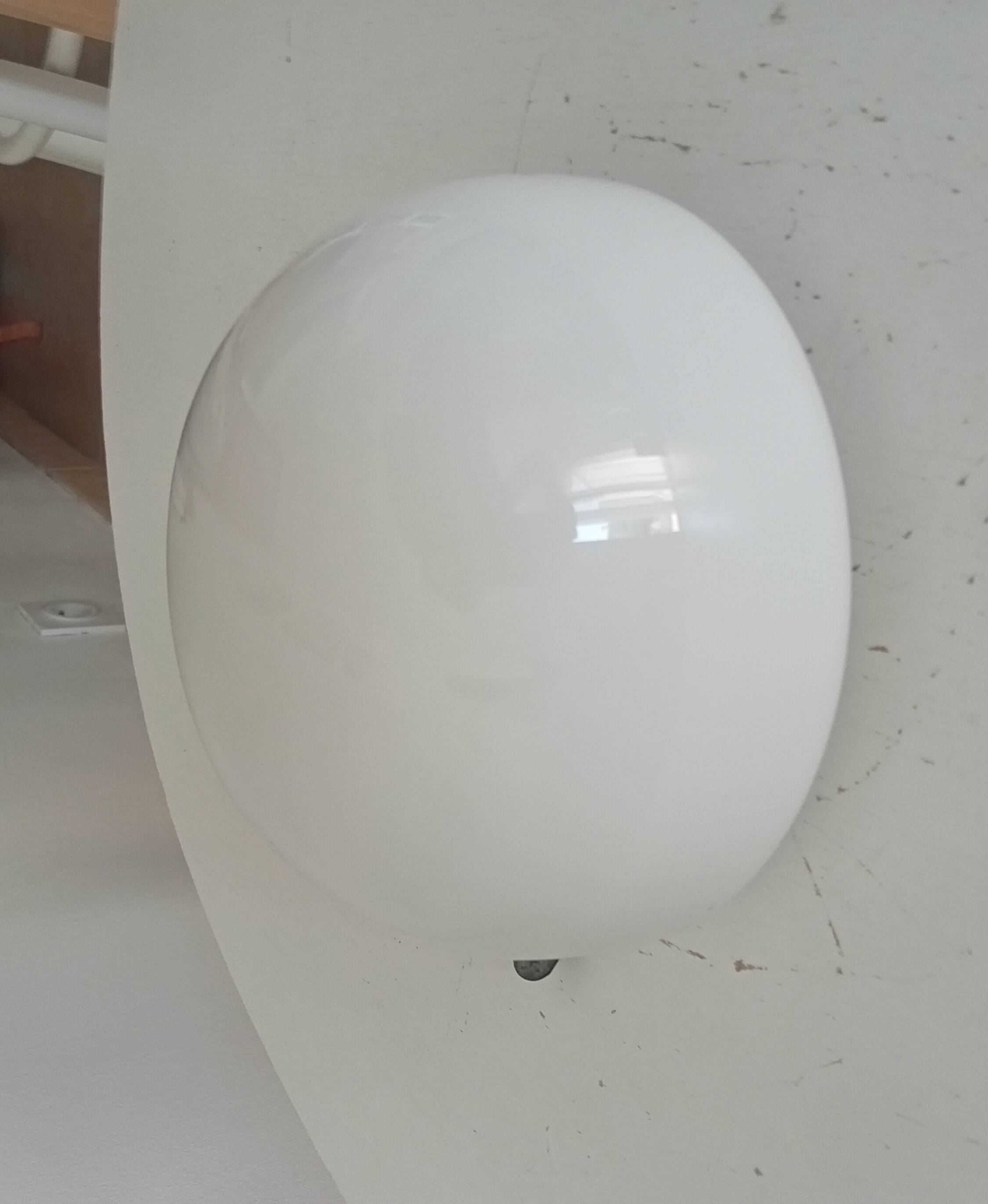 Vintage opaline wall light from the 1960s.