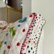 Cushion in hand-embroidered hemp.