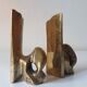 Super rare pair of brutalist brass bookends by David Marshall.
