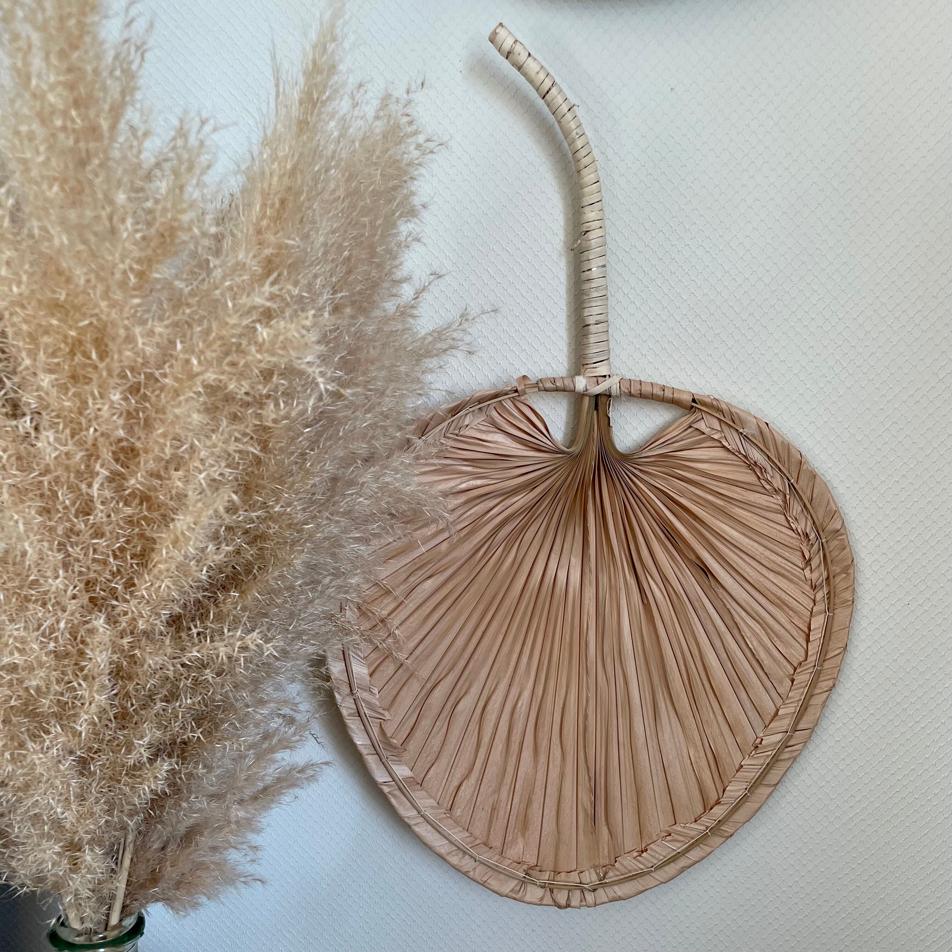 Braided palm leaf fan shape