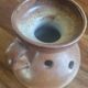 Stoneware vase with flower spikes