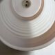 Opaline corrugated tube suspension