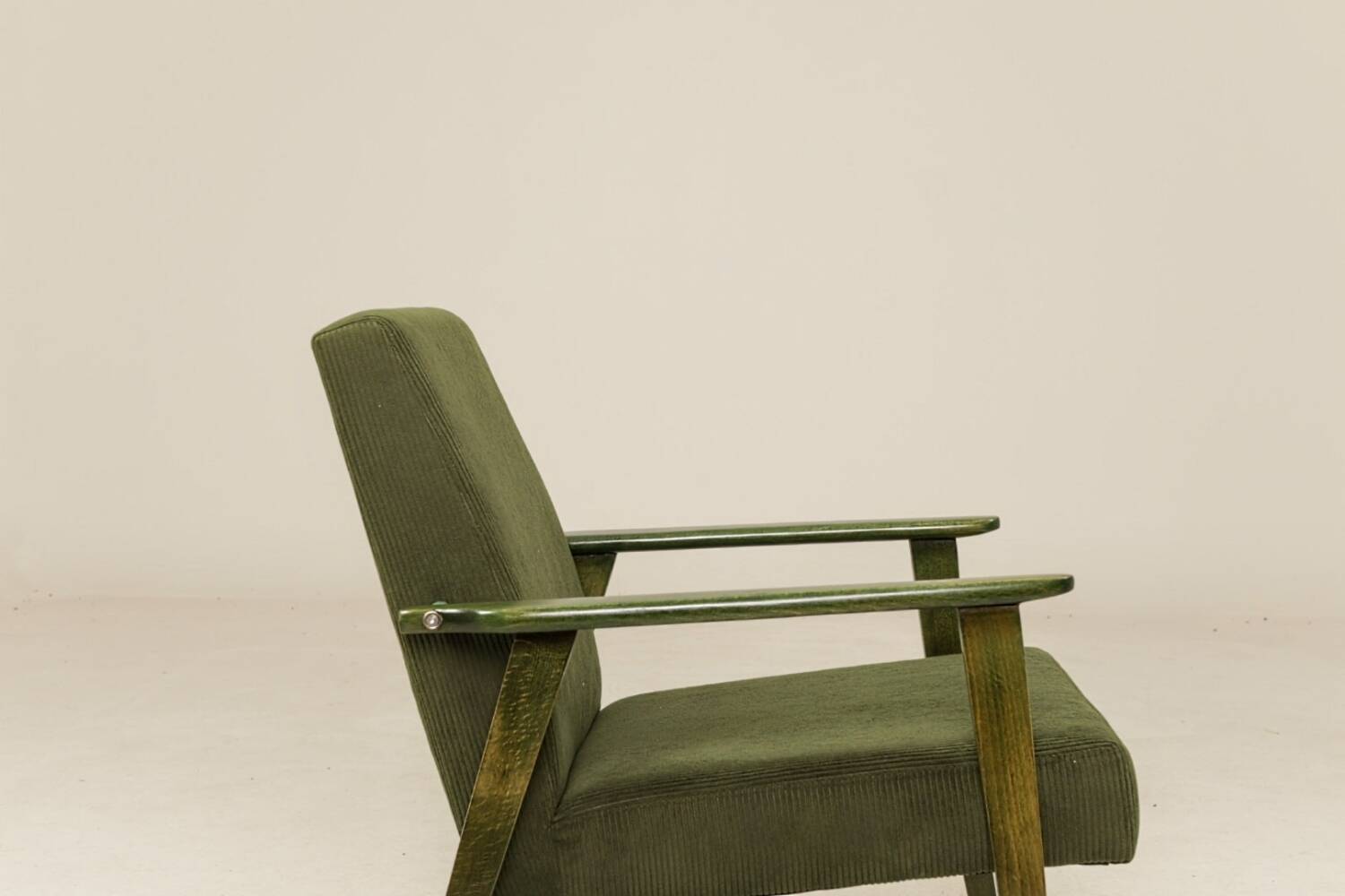 Scandinavian armchair deep olive green 1970s Boho style