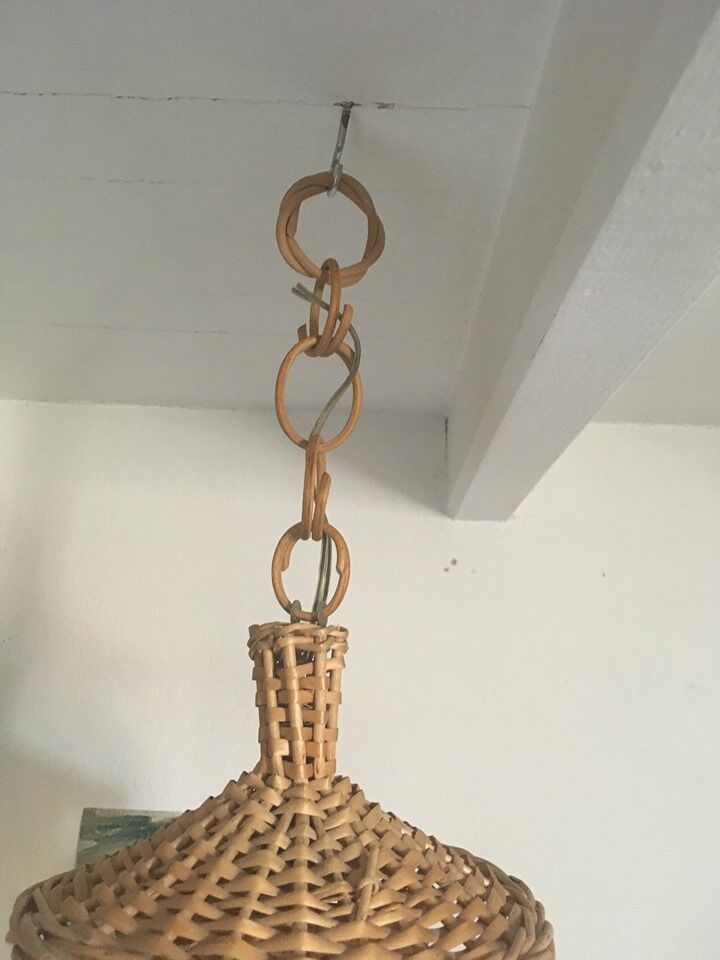 Suspension in wicker and amber glass