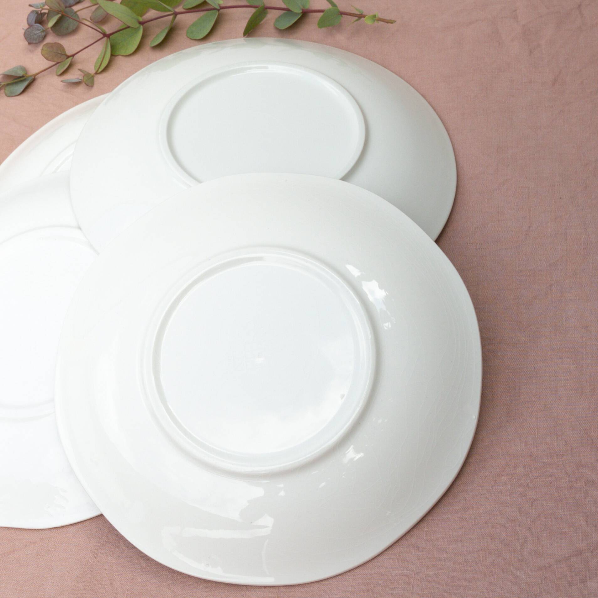 4 blue Gien plates with castle village bridge decor