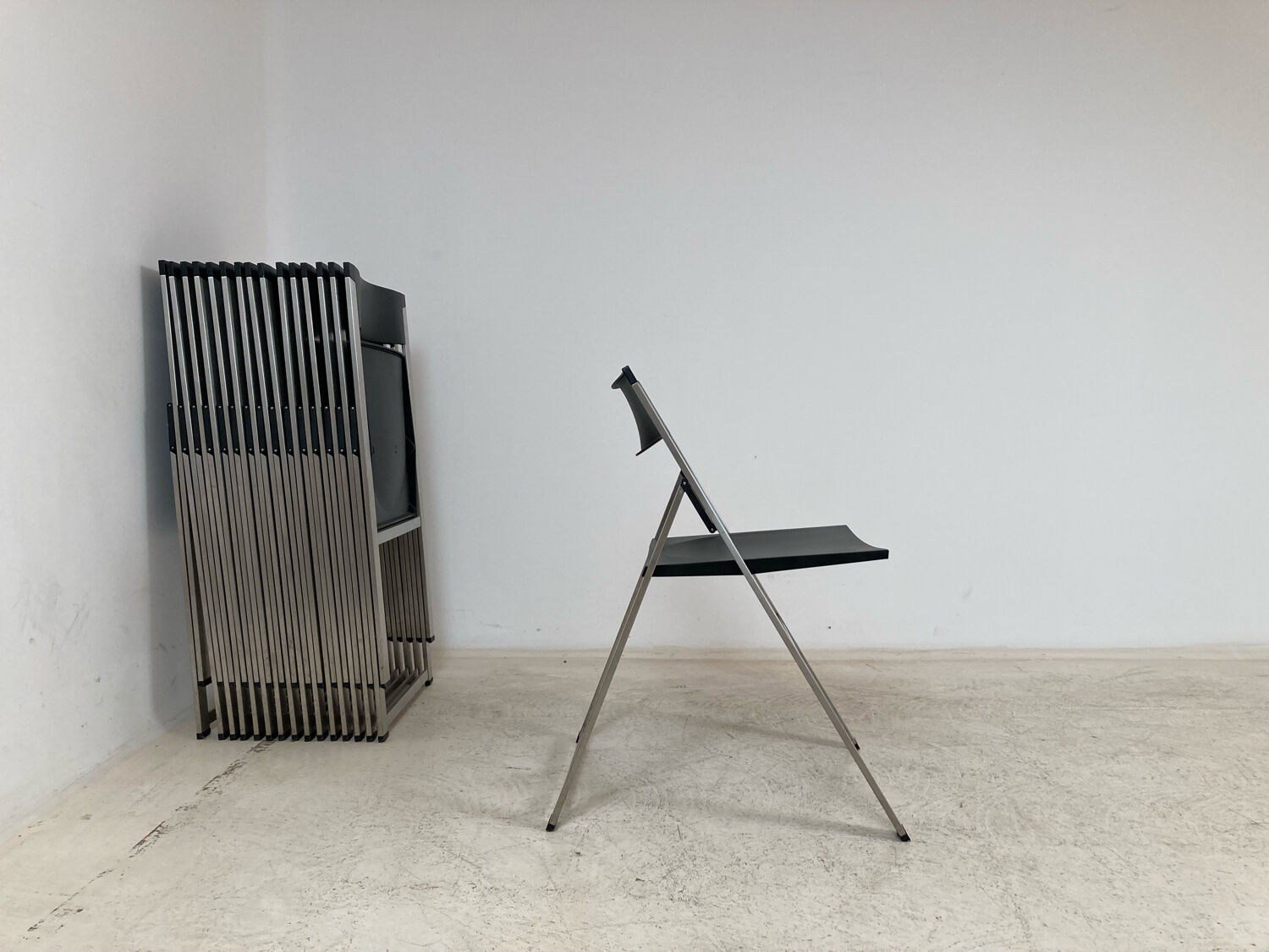 P08 folding chairs by Justus Kolberg for Tecno 1991