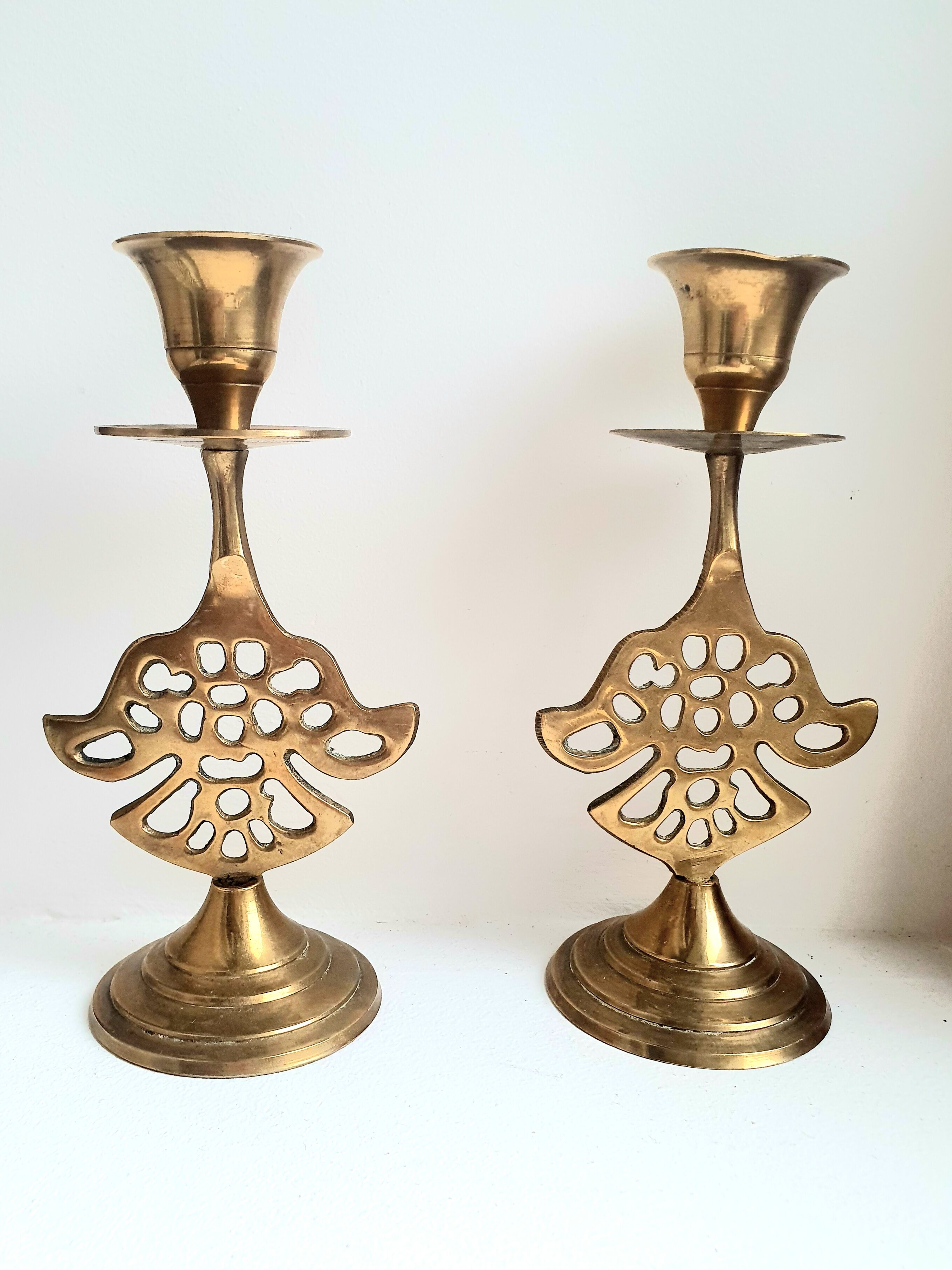 Pair of golden brass candle holders