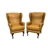 Paire de fauteuil anglais à oreilles des années 1980 en cuir