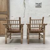 Pair of wooden armchairs and ropes