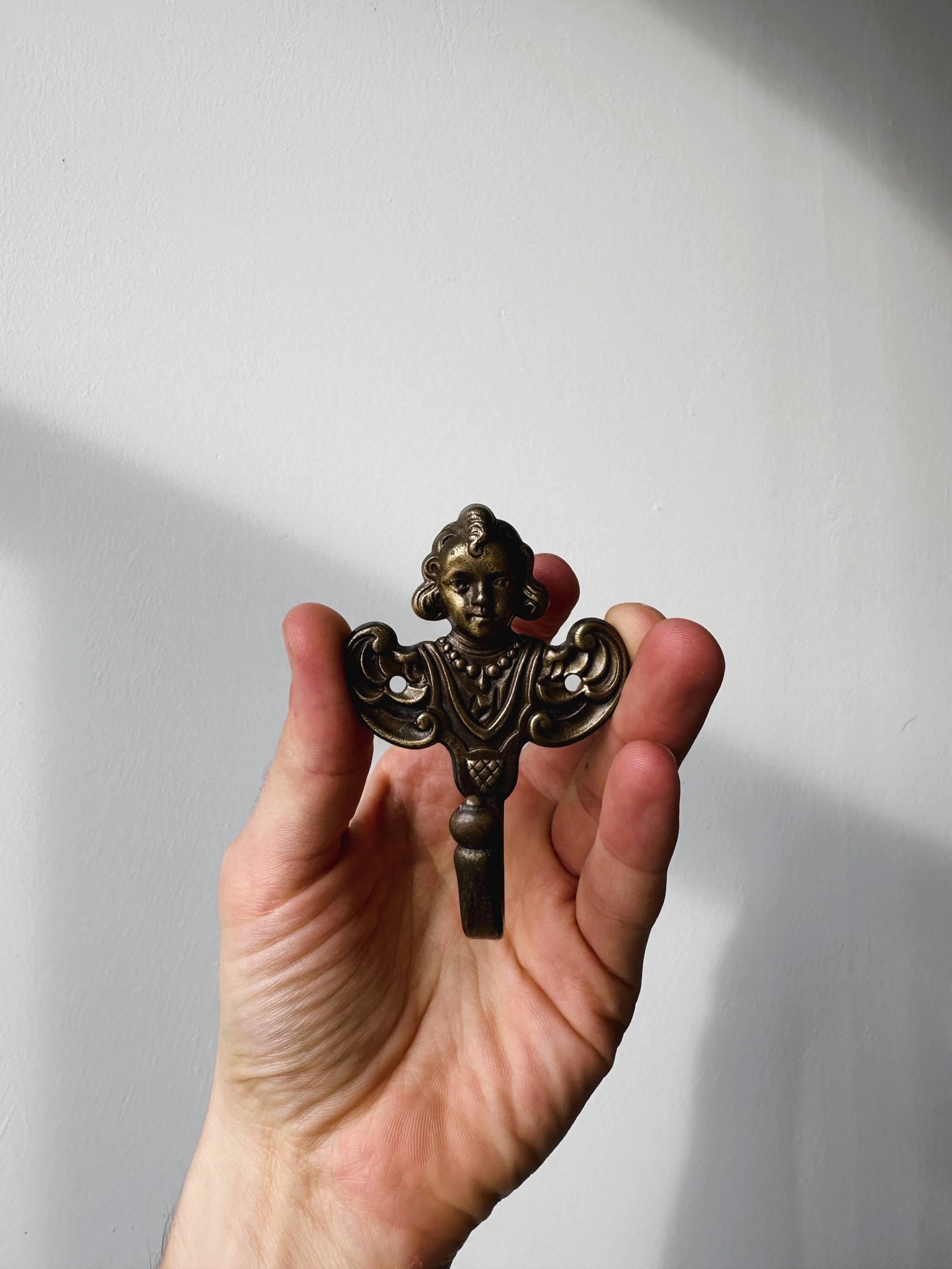 Set of metal coat hooks / angel towel hooks