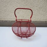 Old red-painted metal egg basket