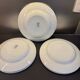 Set of 7 Terre de fer soup plates, green