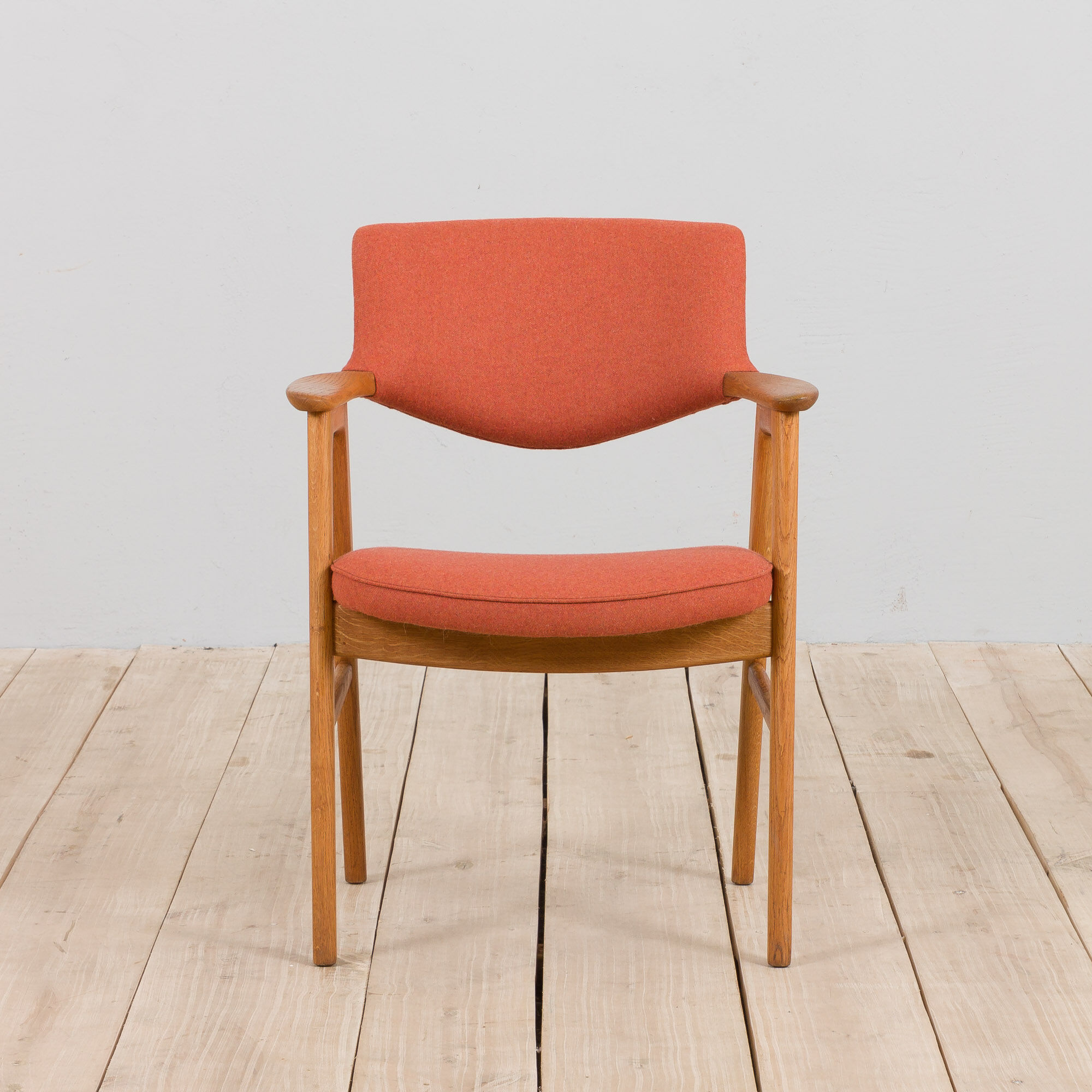 Erik Kirkegaard Oak desk chair in new pale red  wool upholstery.