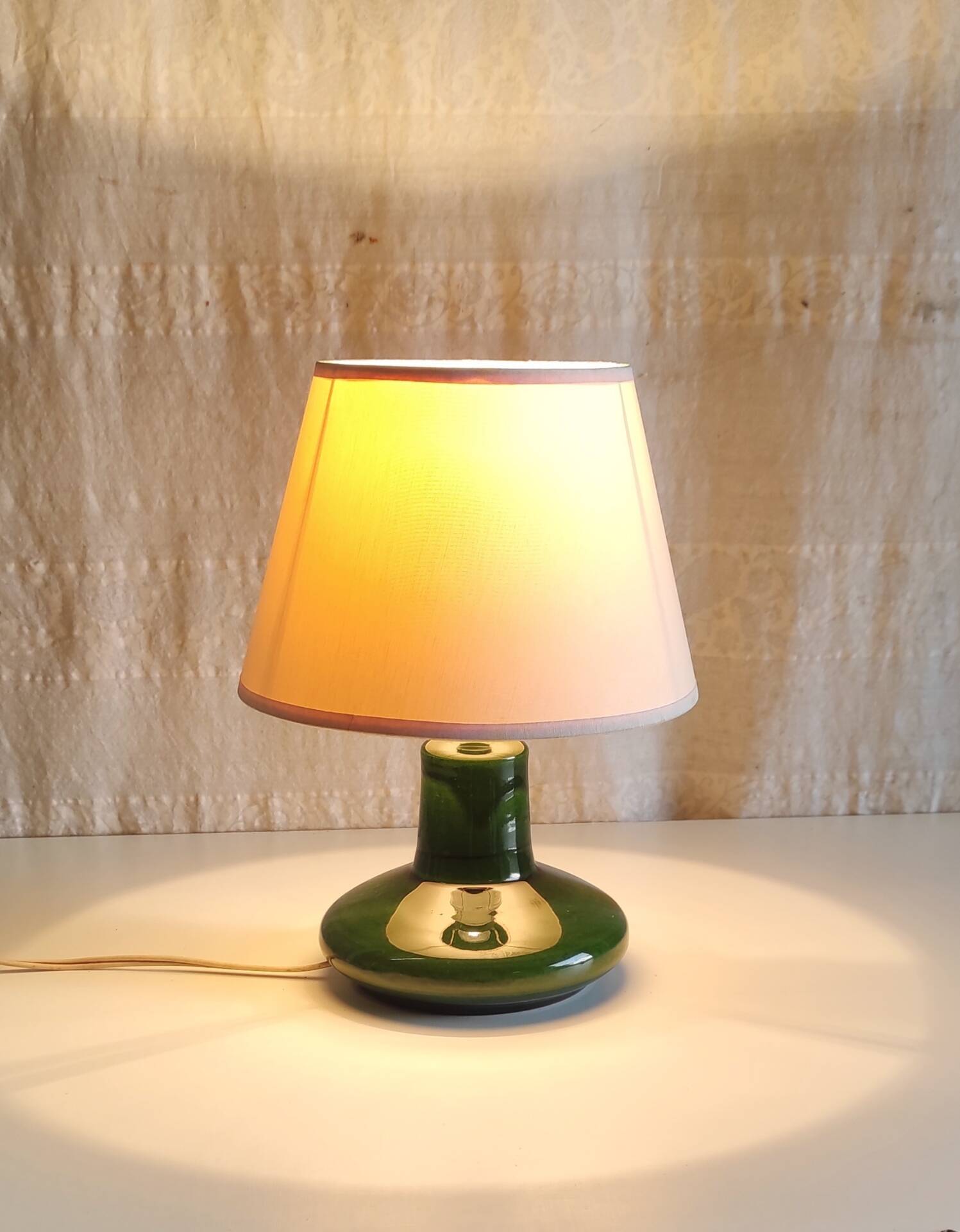 Green glazed ceramic table lamp base in Scandinavian style.