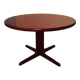 Round rosewood table with central leg, Scandinavian design møllers møbelfabrik