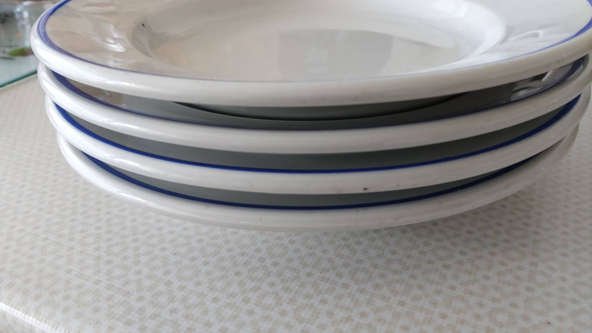 3 Pillivuyt white porcelain dinner plates with blue edging.