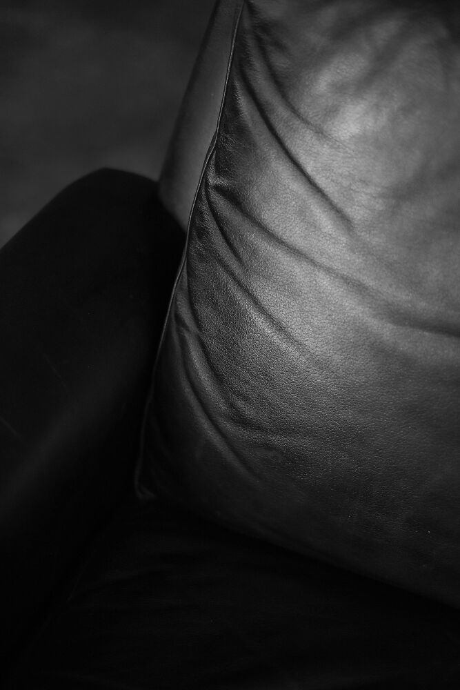 Mid-century danish modern minimalist black leather swivel armchair by georg thams, 1960s