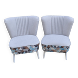 Set of 2 vintage multicoloured cocktail chairs in fabric and wood from the 1950s.