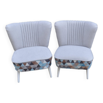 Set of 2 vintage multicoloured cocktail chairs in fabric and wood from the 1950s.
