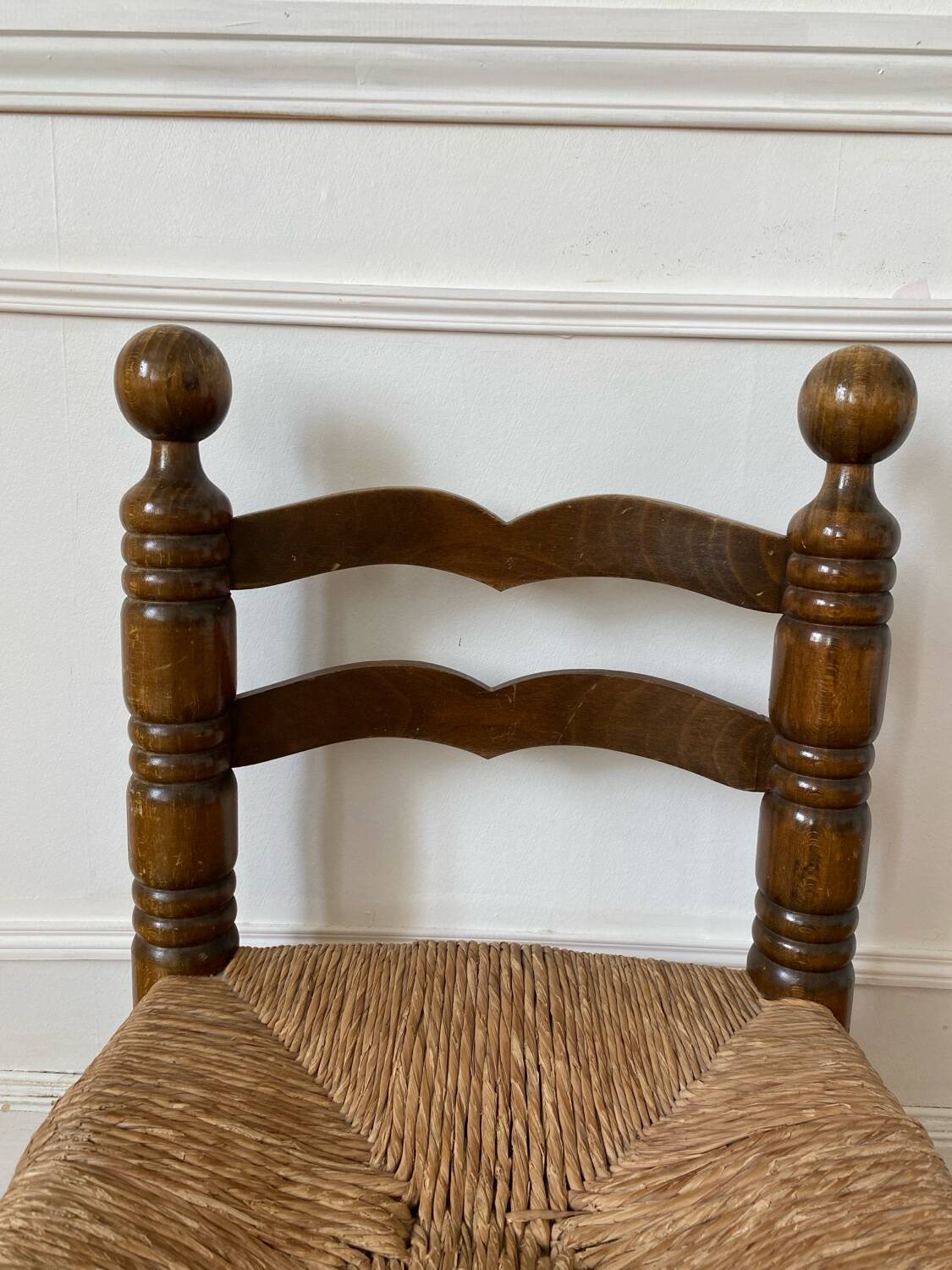 Low fireplace chair in the style of Charles Dudouyt