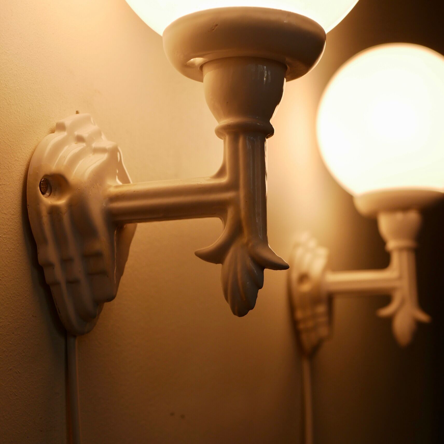 Pair of Art Deco porcelain wall lamps