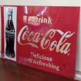 Vintage Coca Cola advertising plaque