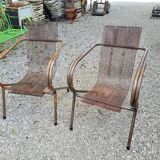 Pair of perforated metal armchairs by René Malaval 1950