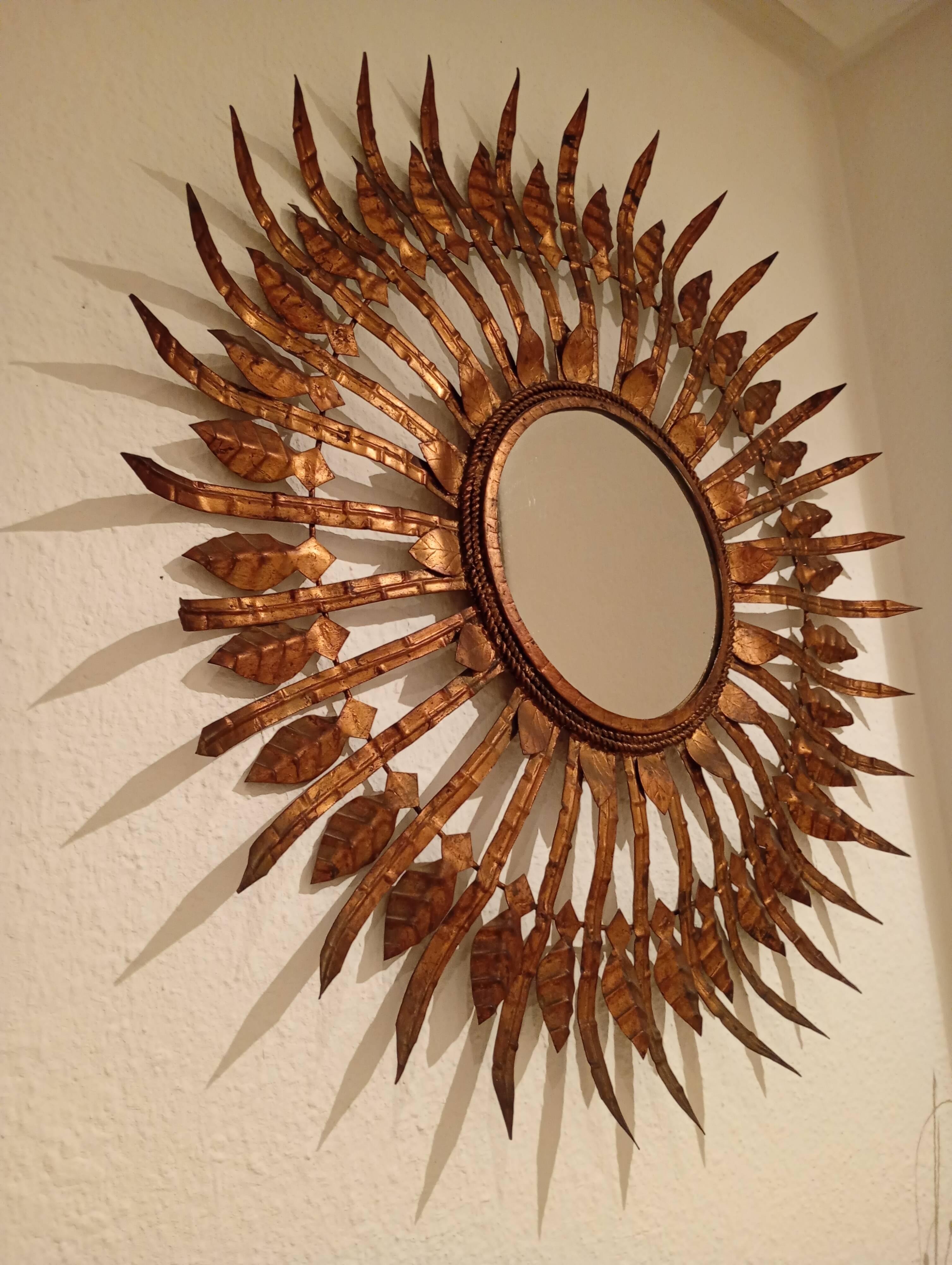 Vintage sun mirror in patinated gold metal – Spain 1950s / 60s
