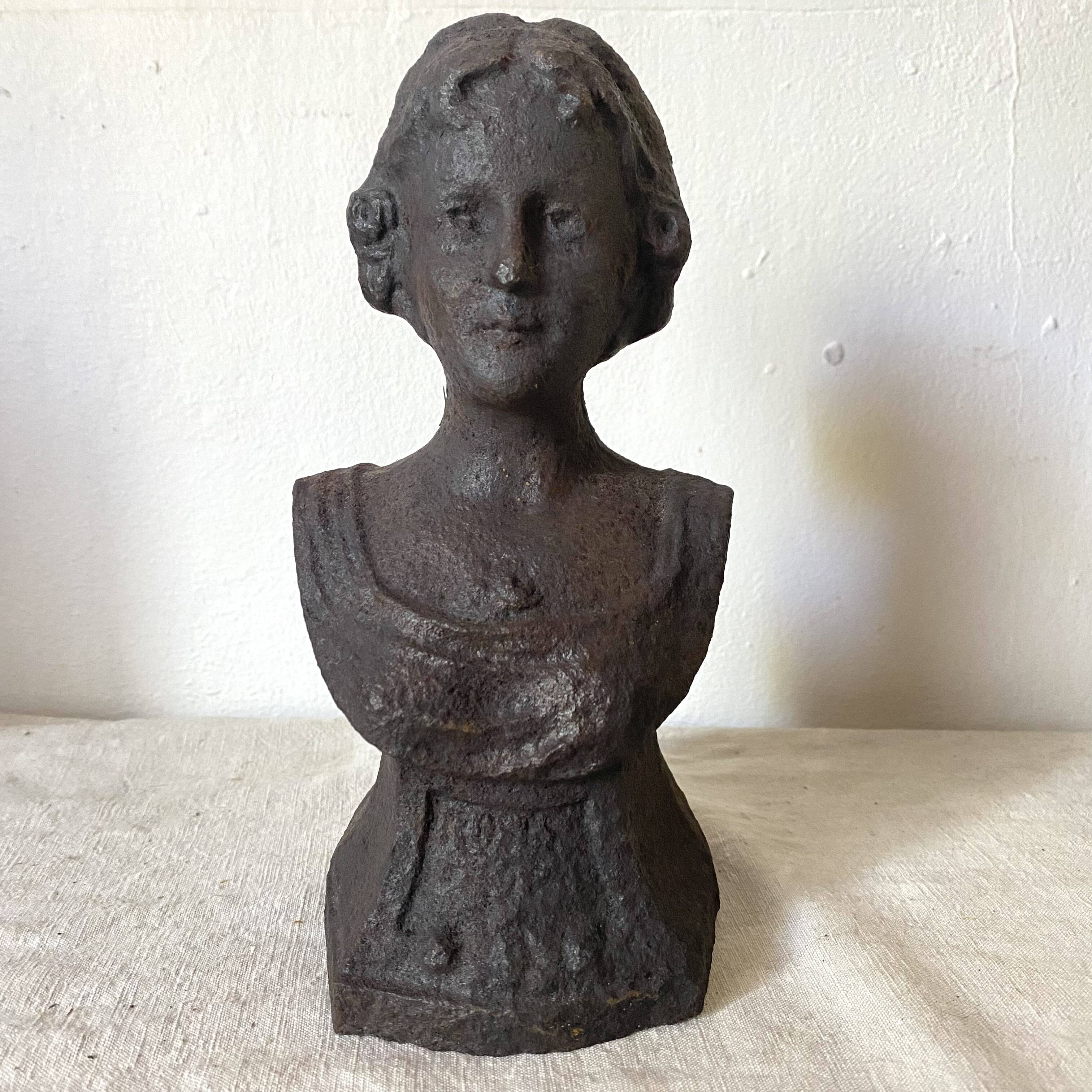 Cast iron bust door stop or bookend