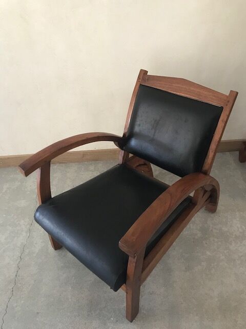 Teak armchair and black leather