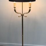 Floor lamp of parquet in neoclassical style in brass with dolphin heads. french work of the ma