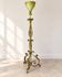 Antique green-painted iron floor lamp with a floral design.