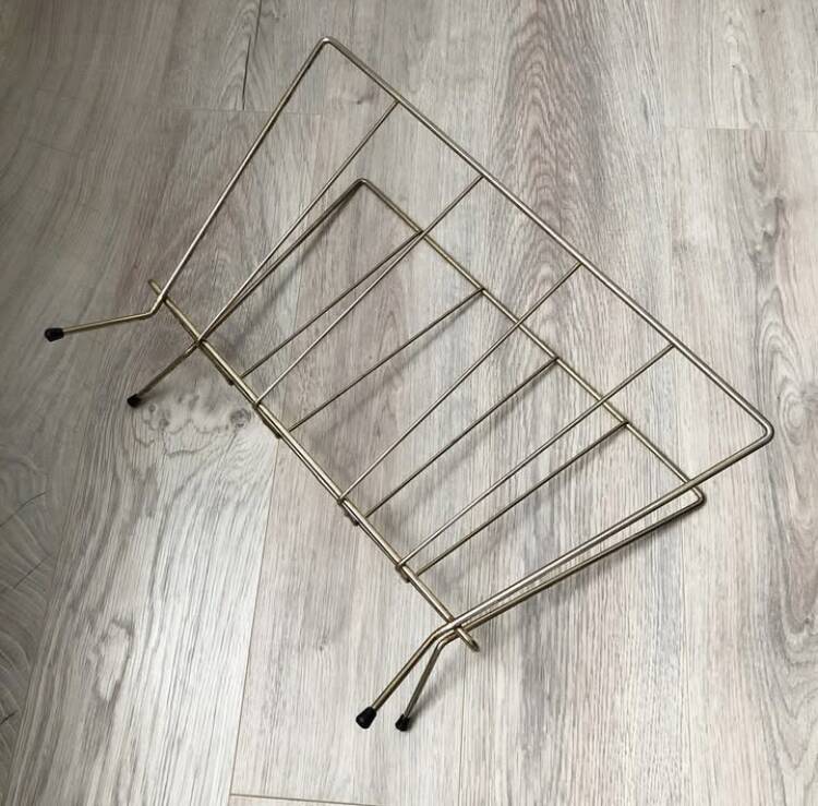 Vintage metal magazine rack