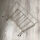 Vintage metal magazine rack