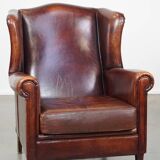 English style sheepskin leather wingback chair in a cognac color