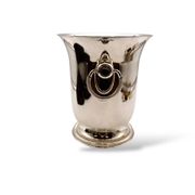 Silver-plated champagne bucket with ring handles.