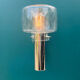 Wall lamp in stainless steel and globe in transparent glass