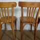4 mismatched signed bistro chairs