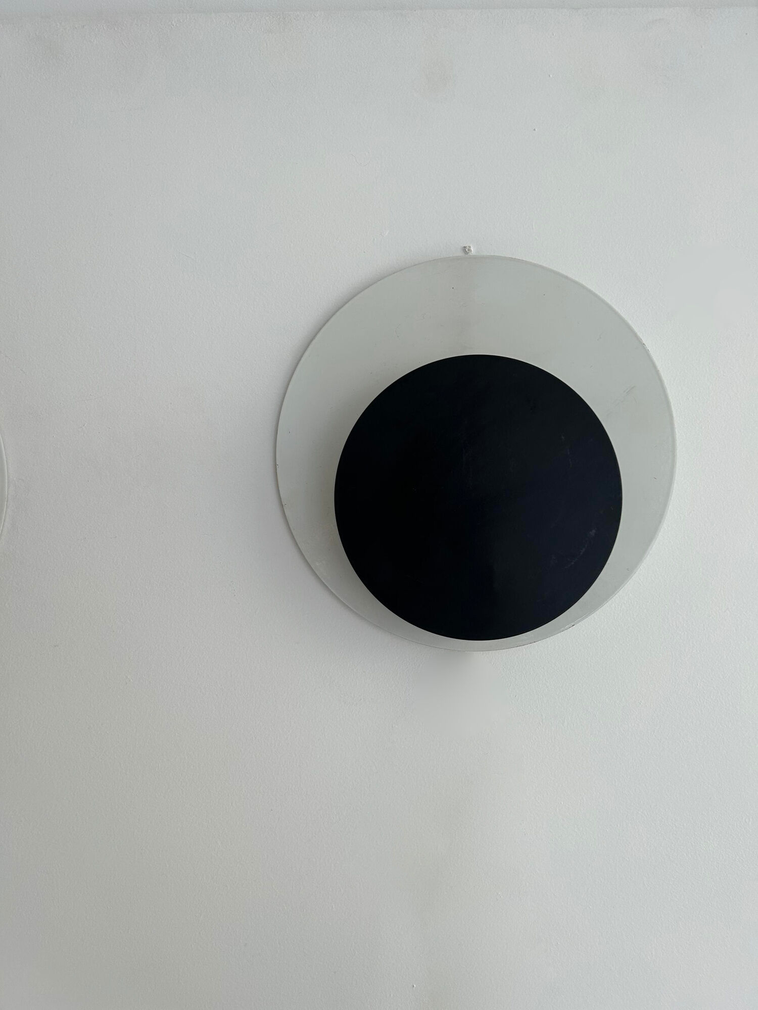 Pair of vintage "Cirkle" wall lights in black and white lacquered metal, Denmark 1970